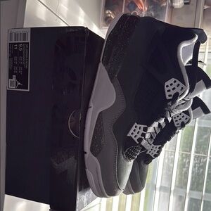 Black and White Air Jordan 4 retro 9.5